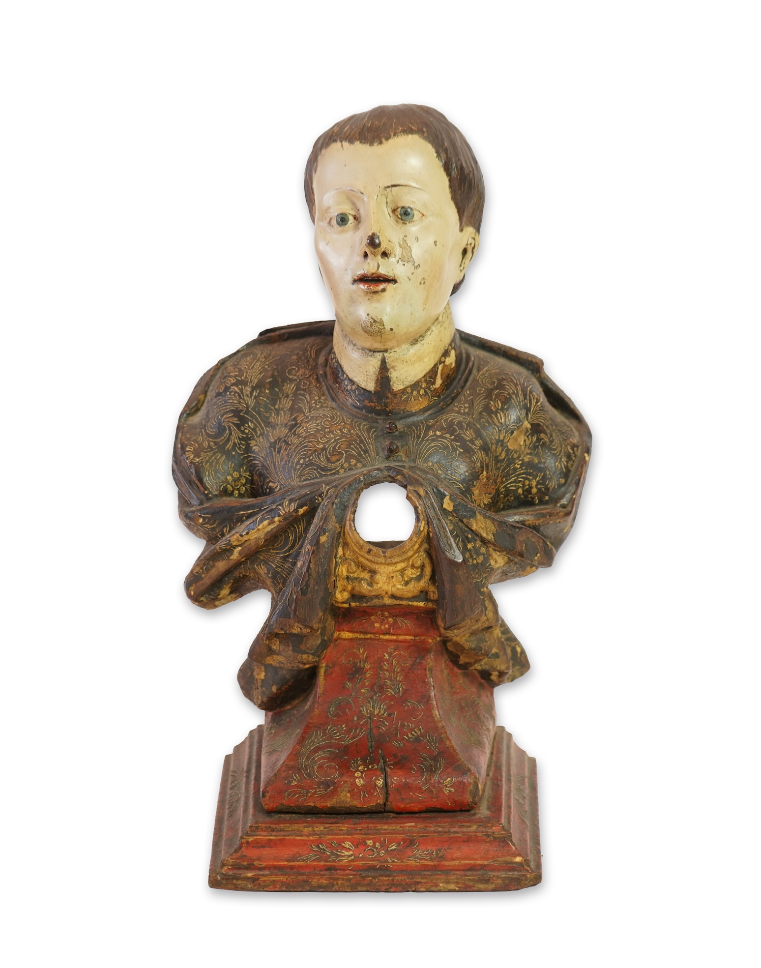 A 19th century Spanish polychrome wood bust of a Saint